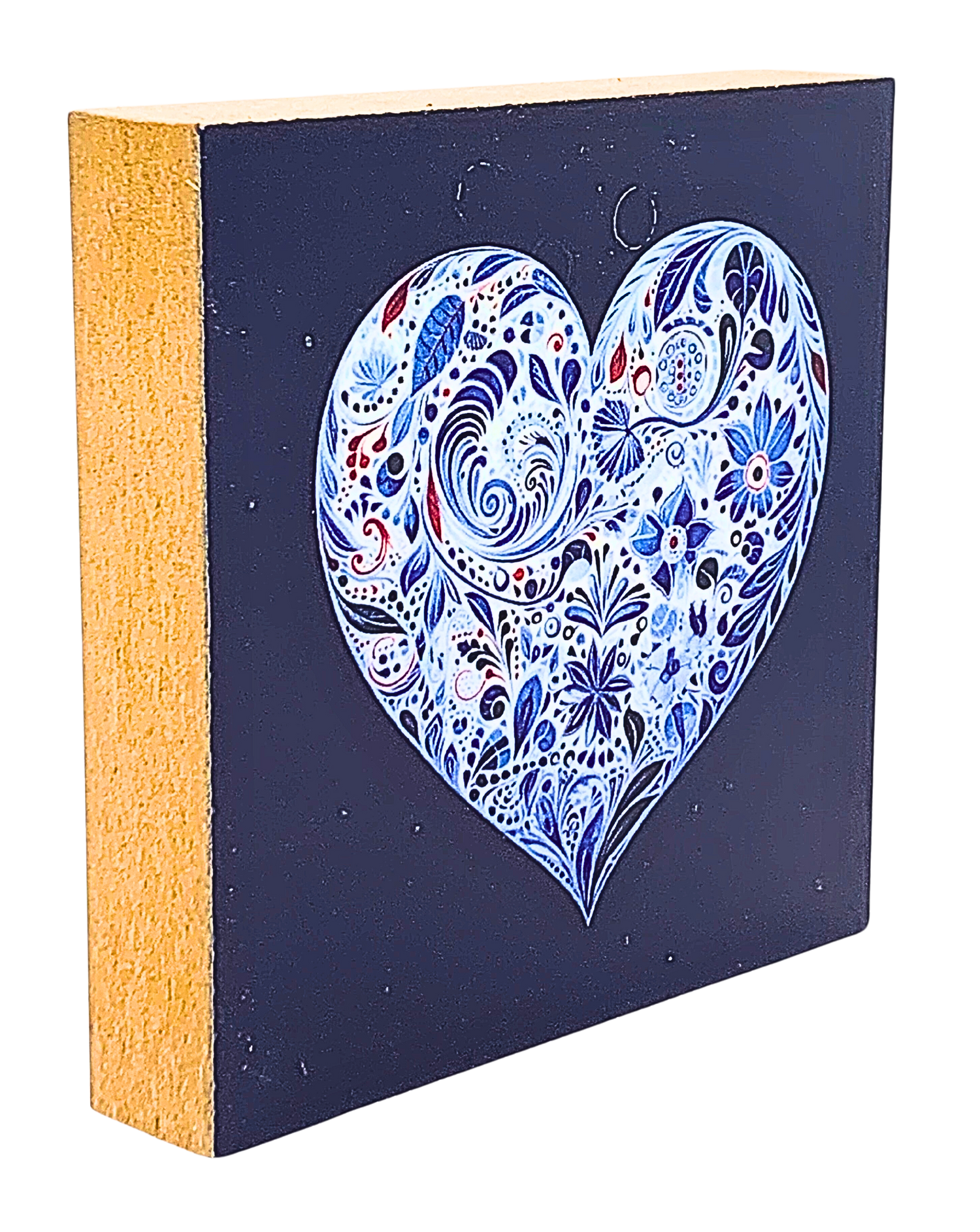 Holzbild 10 x 10 cm mit einem Herz aus blauen, floralen Mustern auf dunkelblauem Hintergrund