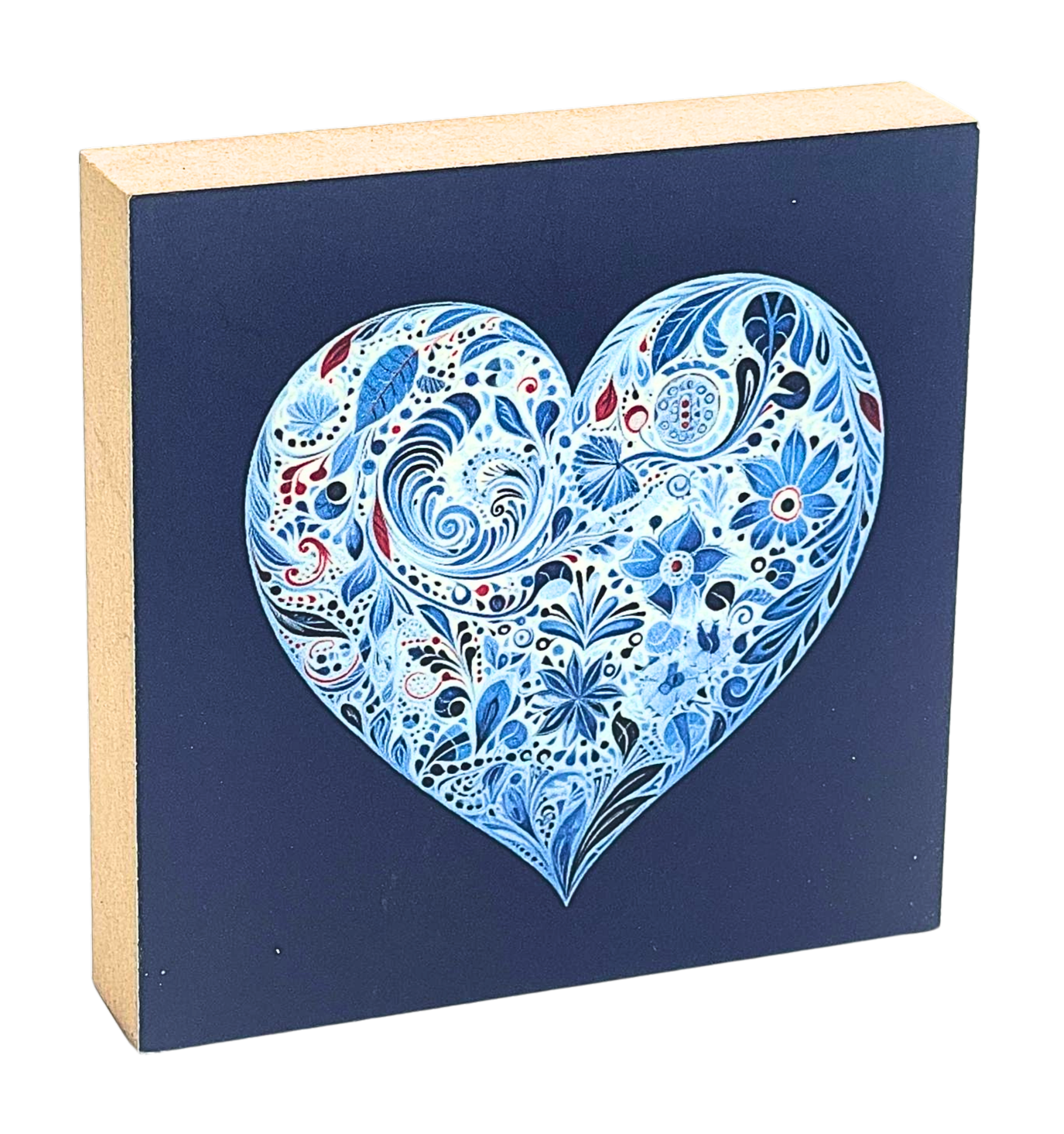 Holzbild 10 x 10 cm mit einem Herz aus blauen, floralen Mustern auf dunkelblauem Hintergrund
