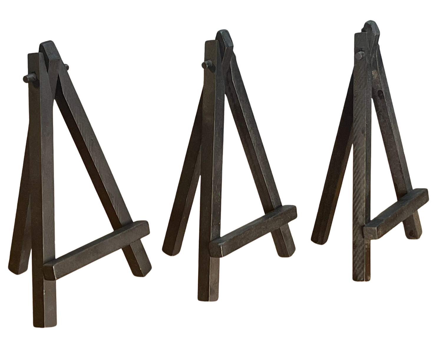 Drei kleine schwarze Staffeleien aus Holz – perfekt für mehrere Holzbilder oder Deko-Sets